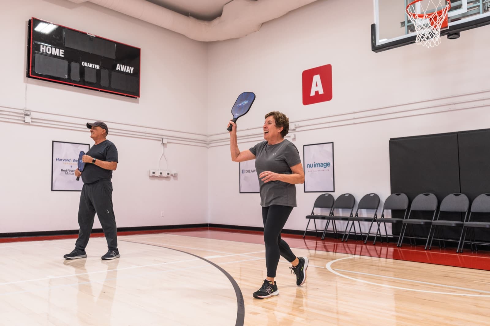 Two Prairie Pickleball members rallying on the indoor court in Regina