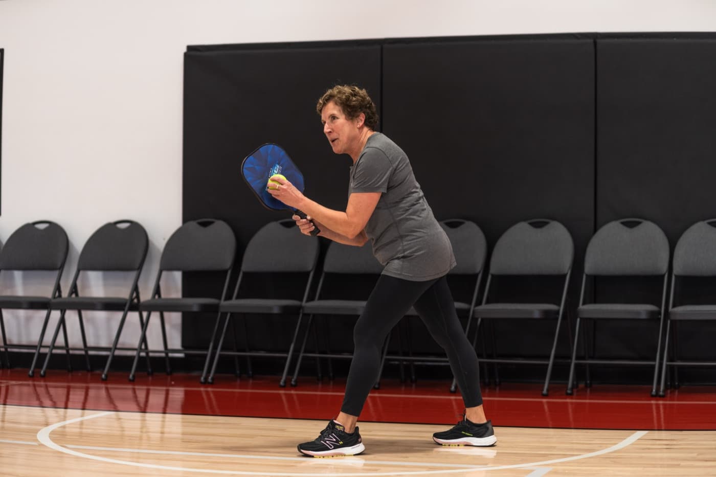 A Prairie Pickleball member waiting at the net in Regina